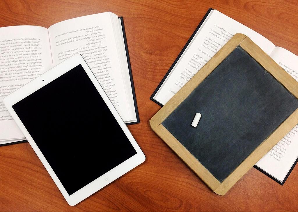 Woman reviewing program details on tablet device